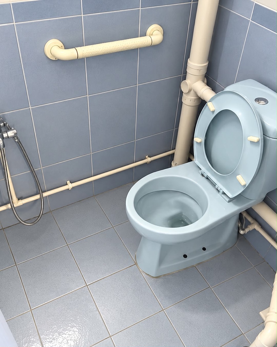 HDB bathroom after cleaning by Kin & Klean
