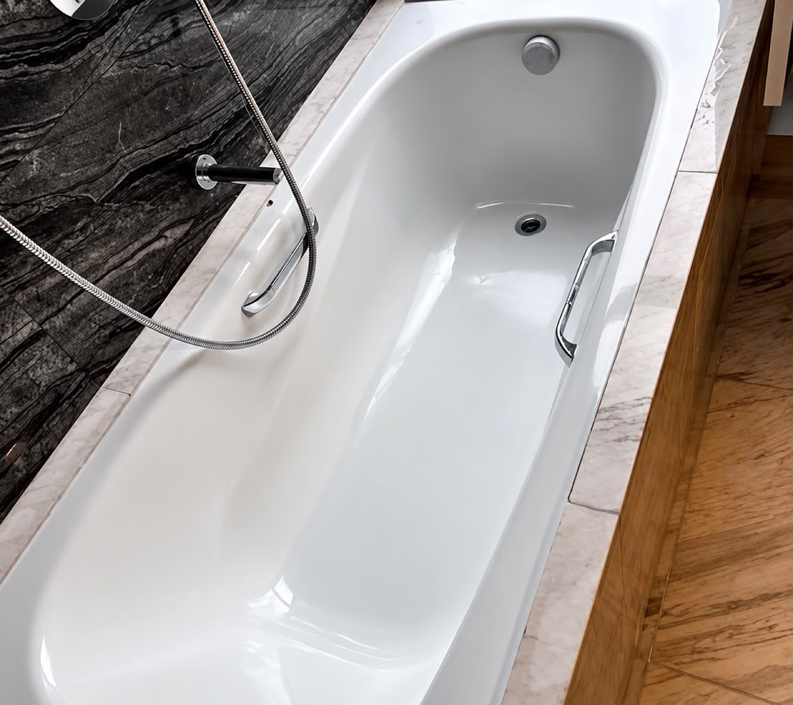 Bathtub, polished — real Kin & Klean job